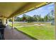 Large backyard with a fire pit at 12026 Penguin Ave, Weeki Wachee, FL 34614