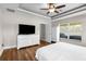 The main bedroom offers a closet and a large white dresser for storage at 12026 Penguin Ave, Weeki Wachee, FL 34614