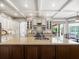 Bright, modern kitchen with stainless steel appliances and granite countertops provides a perfect cooking space at 12060 Sapphire Dr, Spring Hill, FL 34609