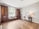 Spacious living room with built-in cabinets and window seating, offering ample storage and natural light at 12060 Sapphire Dr, Spring Hill, FL 34609