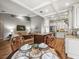 Open-concept living space featuring a kitchen, breakfast nook, and living room at 12060 Sapphire Dr, Spring Hill, FL 34609