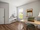Home office featuring a desk, chair, shelving, and large window, perfect for working from home at 12060 Sapphire Dr, Spring Hill, FL 34609