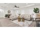 Inviting living room with stylish decor, light-colored couches, modern lighting, and bright flooring at 12420 Talpa St, Spring Hill, FL 34608