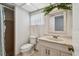 Bathroom with a vanity and tiled shower at 1265 Royal Oak Dr, Dunedin, FL 34698