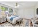 Bedroom featuring a plush bed and a neutral color scheme at 1265 Royal Oak Dr, Dunedin, FL 34698