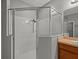 Modern bathroom features a large glass-enclosed shower with chrome fixtures at 13049 Moonstone Way, Spring Hill, FL 34609