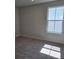 Comfortable bedroom with plush carpeting and window that provides natural light at 14437 Maiden Ter, Lakewood Ranch, FL 34211