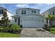 Charming two-story home featuring a two-car garage and well-maintained landscaping at 14437 Maiden Ter, Lakewood Ranch, FL 34211