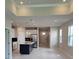 Open floor plan showcasing the kitchen and living area with recessed lighting throughout at 14437 Maiden Ter, Lakewood Ranch, FL 34211