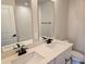 Bright bathroom with double sink vanity and a large mirror at 14441 Maiden Ter, Lakewood Ranch, FL 34211
