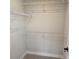 Walk-in closet featuring carpeted floor and multiple adjustable wire shelves for ample storage at 14441 Maiden Ter, Lakewood Ranch, FL 34211