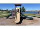 Community playground with diverse climbing and sliding structures offering recreation at 1783 Oak Hammock Ct, Lutz, FL 33558