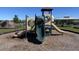 Outdoor playground equipment providing recreation and activity options in a community setting at 1783 Oak Hammock Ct, Lutz, FL 33558
