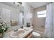 Neutral bathroom featuring a large vanity with a tub and shower combo at 2048 Ground Squirrel Dr, New Port Richey, FL 34655