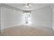 Bonus room with tile flooring and two windows at 2048 Ground Squirrel Dr, New Port Richey, FL 34655