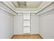Walk-in closet with built in shelving at 2101 Sunset Point Rd # 201, Clearwater, FL 33765