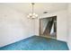 This spacious dining room features views to the stairway and adjacent rooms at 2101 Sunset Point Rd # 201, Clearwater, FL 33765