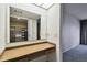 Bright dressing room with a skylight, built-in vanity, and ample storage space at 2101 Sunset Point Rd # 201, Clearwater, FL 33765