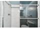 Walk-in shower with glass doors at 2101 Sunset Point Rd # 201, Clearwater, FL 33765