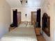 Bedroom with a queen sized bed and mirror at 21045 Lazy Days Cir, Lutz, FL 33558