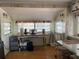 Cozy dining area featuring natural light, neutral tones, and functional furniture for a comfortable dining experience at 21045 Lazy Days Cir, Lutz, FL 33558