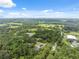 Idyllic aerial shot of home amidst lush landscape, perfect for nature lovers at 2288 Rackley Rd, Brooksville, FL 34604