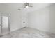 A clean bedroom features marble flooring, large closets and a window bringing in tons of natural light at 2288 Rackley Rd, Brooksville, FL 34604