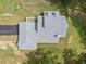 Aerial view of a home's gray roof highlighting its architectural design and showcasing its well-maintained condition at 2288 Rackley Rd, Brooksville, FL 34604