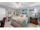Light and airy bedroom with nautical decorations, neutral walls and carpet flooring at 2342 Countryside Dr, Spring Hill, FL 34606