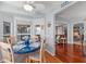 Cozy breakfast nook with a round table, bay window, and hardwood floors at 2342 Countryside Dr, Spring Hill, FL 34606