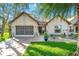 Charming single-story home featuring a well-manicured lawn and an attached two-car garage at 2342 Countryside Dr, Spring Hill, FL 34606
