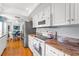 Well-lit kitchen with granite counters, stainless steel appliances, and backyard views at 2342 Countryside Dr, Spring Hill, FL 34606