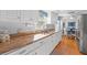 Kitchen with a sink that offers natural light and stylish countertops at 2342 Countryside Dr, Spring Hill, FL 34606