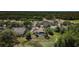 Aerial shot of a house near a golf course and other community amenities at 2987 Wentworth Way, Tarpon Springs, FL 34688