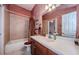 A well-maintained bathroom with a shower-tub combination and a single sink vanity at 2987 Wentworth Way, Tarpon Springs, FL 34688