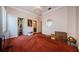 Spacious bedroom with walk-in closet and ensuite bathroom access at 2987 Wentworth Way, Tarpon Springs, FL 34688