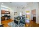 Upstairs bonus room with comfortable seating and desk area at 2987 Wentworth Way, Tarpon Springs, FL 34688