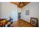 Bright living room with hardwood floors and tray ceiling at 2987 Wentworth Way, Tarpon Springs, FL 34688