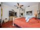 Comfortable primary bedroom with ceiling fan at 2987 Wentworth Way, Tarpon Springs, FL 34688
