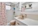 Cozy bathroom features a shower with a starfish-themed curtain and a unique vintage-style faucet at 3118 Lloyd Dr, Holiday, FL 34691