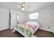 Sunlit bedroom boasts built-in storage and a bright window at 3118 Lloyd Dr, Holiday, FL 34691