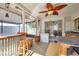 Inviting screened-in porch with an outdoor bar, a freezer, and access to the backyard at 3118 Lloyd Dr, Holiday, FL 34691