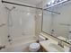 Bathroom with a shower-tub combo, single sink vanity, and a mirror at 4015 Angel Oak Ct # 201, Tampa, FL 33613