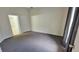 Bedroom featuring gray carpet, access to ensuite bathroom, and closet at 4015 Angel Oak Ct # 201, Tampa, FL 33613