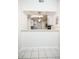 Bright dining area with tile flooring and a partial view into the kitchen featuring modern appliances at 4015 Angel Oak Ct # 201, Tampa, FL 33613