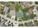 Aerial view of a neighborhood highlighting home and pool layouts at 4052 Marine Pkwy, New Port Richey, FL 34652