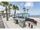 Beachside amenities featuring picnic tables, grills, and scenic waterfront views at 4052 Marine Pkwy, New Port Richey, FL 34652