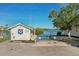 Charming Coast Guard building with waterfront view, and adjacent parking lot at 4052 Marine Pkwy, New Port Richey, FL 34652