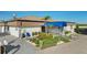 Inviting Yacht Club building with a well-maintained exterior and landscaping at 4052 Marine Pkwy, New Port Richey, FL 34652