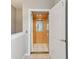 Residential elevator with wood-paneled interior and tiled floor; convenient accessibility feature at 4052 Marine Pkwy, New Port Richey, FL 34652